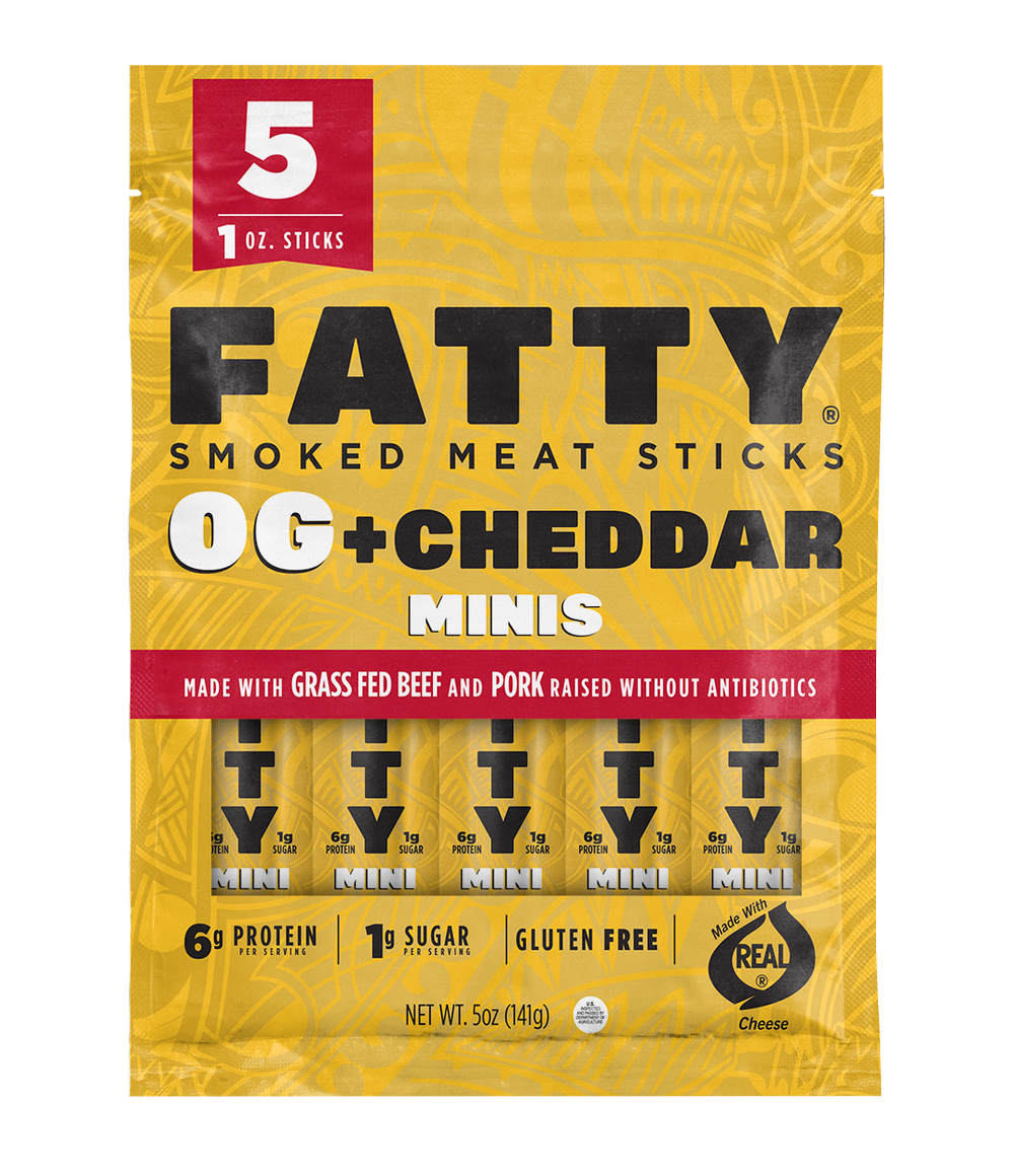 Packaging of FATTY Smoked Meat Sticks OG + Cheddar with five 1 oz. sticks, featuring images of the meat sticks and text describing the product as gluten-free and made with grass-fed beef and pork.